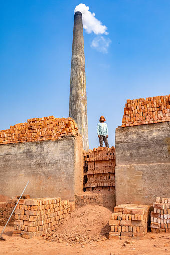 In the outskirts of Bangladesh the Brick Kiln factories are baking bricks in a manual way