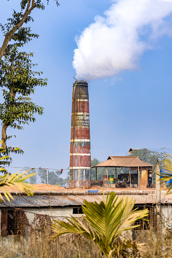 In the outskirts of Bangladesh the Brick Kiln factories are baking bricks in a manual way
