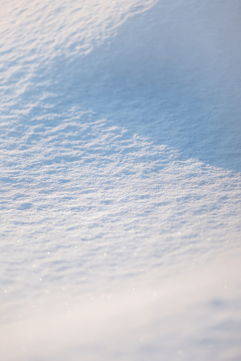 High angle view of snow texture close-up. Winter background.
