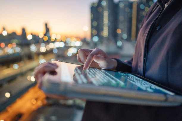 istock FA financial advisor interacting with a customer service chatbot on a business website 1982133180