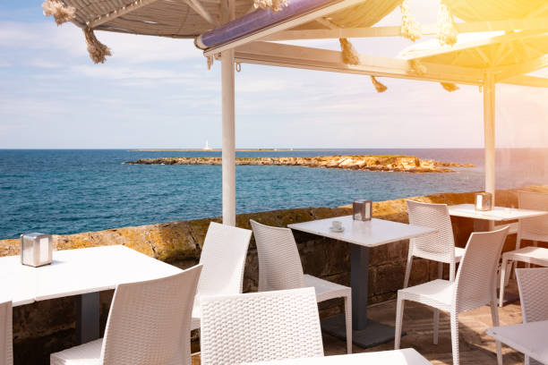 istock Small outdoor cafe on seaside in Italy in summer 1982140151
