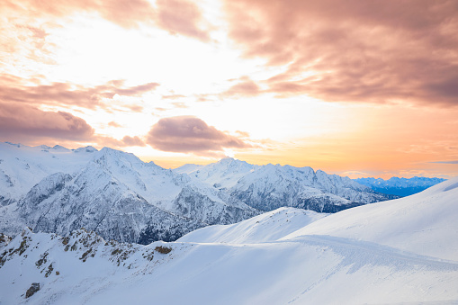 Panoramic landscape Alps mountain peak. Winter sport, ski resort.  Enjoying on sunset  sunny  ski resorts. Powder snow Snowcapped mountain  Dolomite super ski area. Ski resort. Sellaronda, italy, Europe