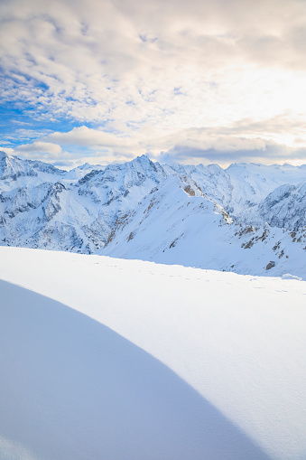 On the top.  Panoramic landscape Alps mountain peak. Winter sport, ski resort.  Enjoying on sunset  sunny  ski resorts. Powder snow Snowcapped mountain  Dolomite super ski area. Ski resort. Sellaronda, italy, Europe