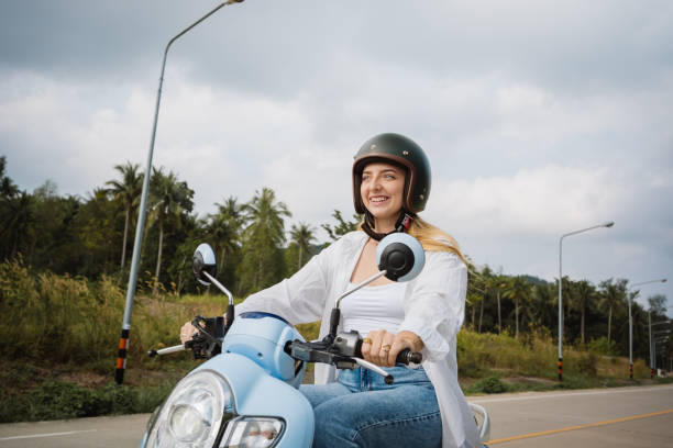 istock Woman riding a bike 1982165025