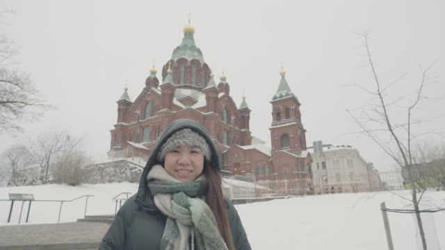 Tourists selfie at Uspensky Cathedral In Helsinki, Finland
