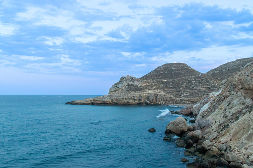 Sunset on the rocky coast of the Cabo de Gata natural park.