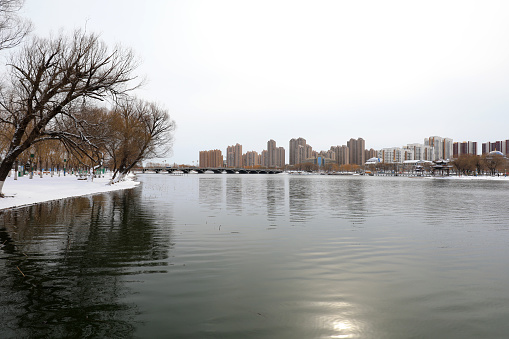 Snowscape of waterfront city, North China