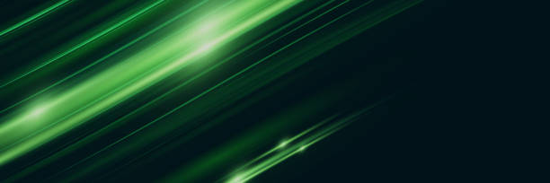 istock The effect of high-speed light trails. Futuristic dynamic motion technology. Neon glowing lines. 1982295231