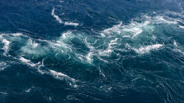 istock The intricate water patterns at Saltstraumen create a mesmerizing texture, perfect for use as a unique natural background 1982301174