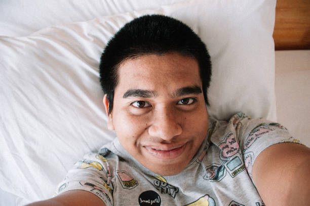 Thai man in hotel room