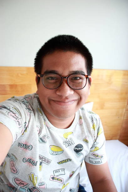 istock Thai man in hotel room 1982338584