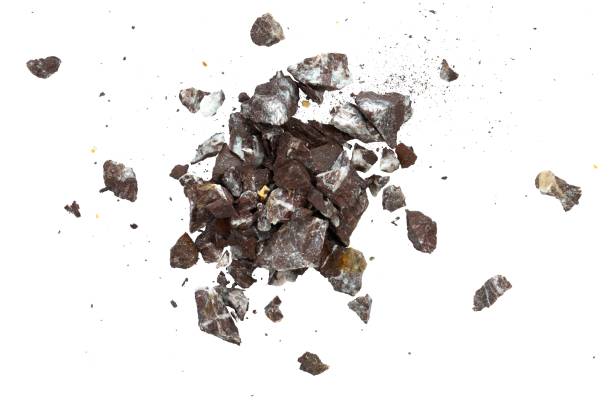 istock explosion of rock particle isolated 1982365035