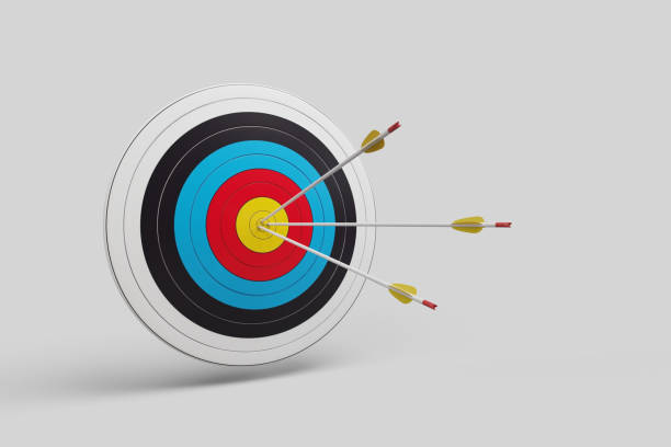 istock Archery target with arrows in the center 1982384233