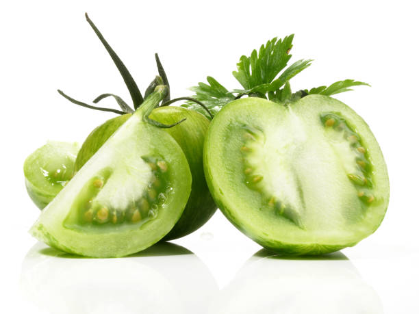 istock Green striped Tomatoes on white Background - Isolated 1982410271