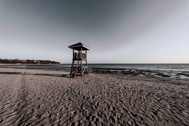 Beach after snowfall in unusually cold weather