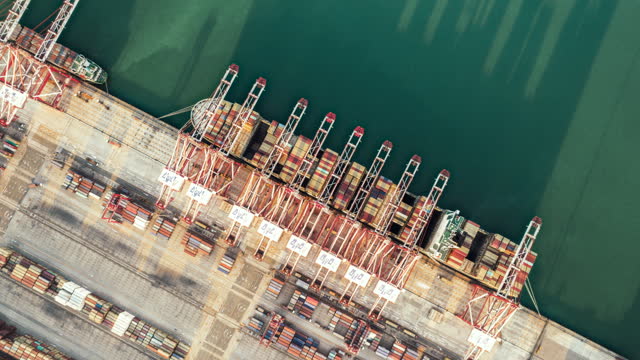 T/L Drone Point View of Busy Industrial Port with Containers Ship