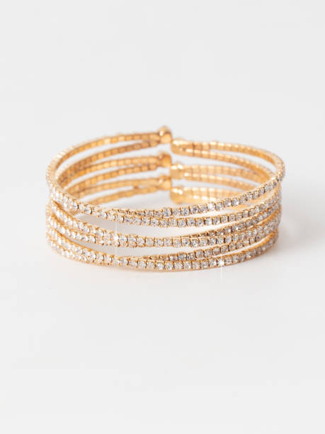 istock Gold bracelet isolated white background 1982472965