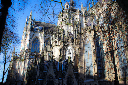 The outside of one of the Netherland's most impressive cathedral's, St John’s Cathedral in Den Bosch (Sint-Janskathedraal in 's-Hertogenbosch) in the province of North Brabant. Taken during a rare snowy day in Holland.