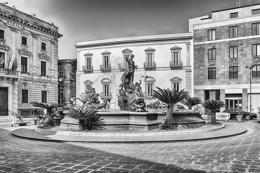 The scenic Fountain of Diana on the Ortygia Island, historical centre of Syracuse, Sicily, Italy