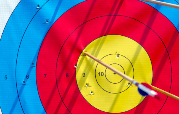 istock Many arrows hitting the archery target, bulls eye 1982536335