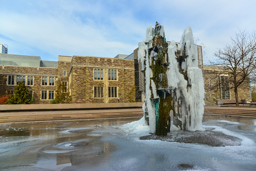 Princeton, NJ USA - November 12, 2019:  Princeton Fountain, where water froze and it was covered with ice.