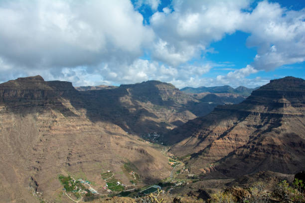 istock Mountains with a small village in the valley 1982539046