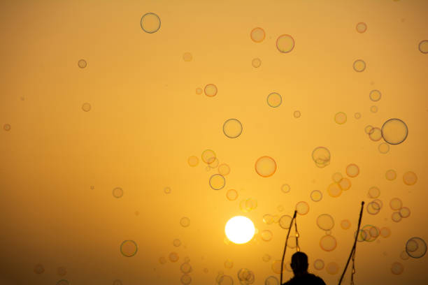 istock A man makes lots of soap bubbles with a bubble stick 1982568006
