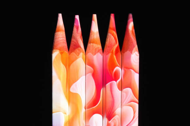 Group of 5 pencils on red background