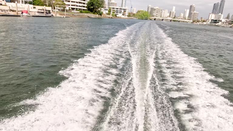 Speedboat Journey Through Urban Waterway