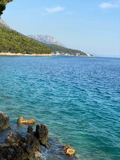 istock rocky shore, blue maybe blue sky in Croatia 1982629781