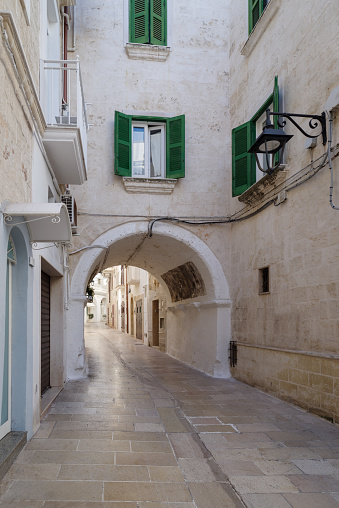 View of street in Monopoli old town, Apulia region, Italy