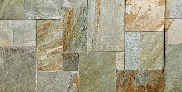 Multicolor rustic slate stone tiles. Background and texture. Full frame.