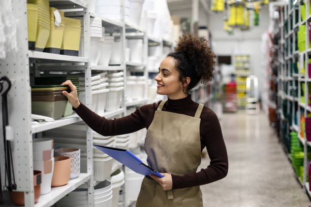 istock Young woman working in a store 1982683752