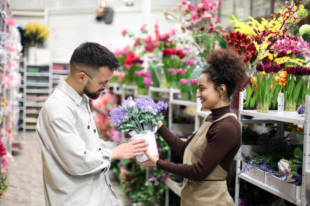 istock Man buying flowers 1982683758