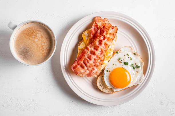 istock Breakfast sandwiches with fried egg, bacon and scrumble 1982685986