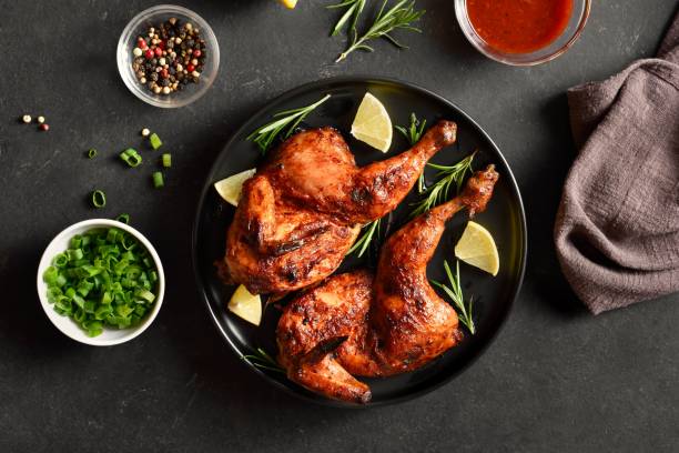 istock Roasted half chicken with lemon and rosemary 1982691424
