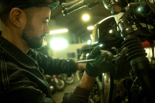 istock Mechanic working on a motorbike 1982691427