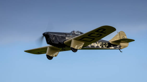 old Warden, UK - 2nd October 2022:  Vintage aircraft 1930's Miles Hawk Speed Six  flying close to the ground