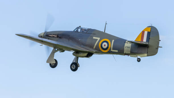 old Warden, UK - 2nd October 2022:  Vintage aircraft Hawker Hurricane fighter taking off from the airfield