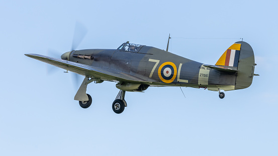 old Warden, UK - 2nd October 2022:  Vintage aircraft Hawker Hurricane fighter taking off from the airfield
