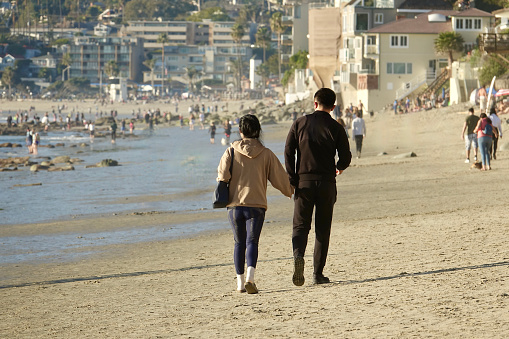 Asian couple holding hands