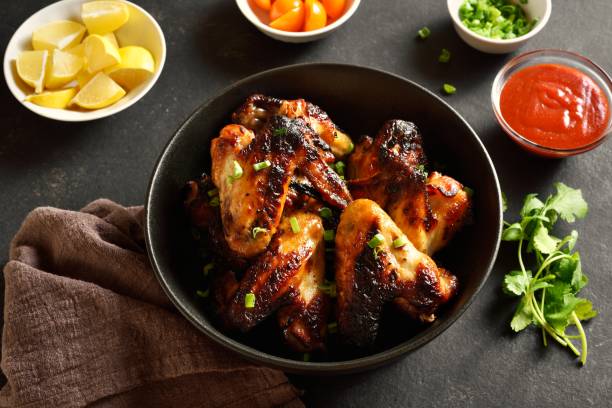 istock Grilled chicken wings in bowl 1982767468