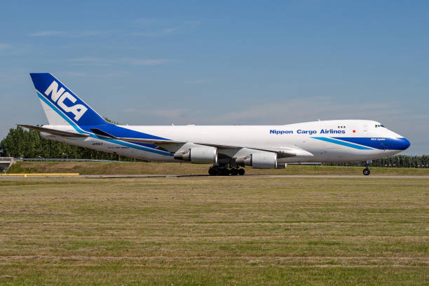 Nippon Cargo Airlines NCA Boeing 747-400F Hoofddorp, Netherlands - August 20, 2010: Japanese Nippon Cargo Airlines NCA Boeing 747-400F with registration JA05KZ rolling on taxiway V of Amsterdam Airport Schiphol nippon cargo airlines photos stock pictures, royalty-free photos & images