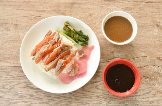 istock slice roasted duck topping rice with pink pickled ginger and boiled cabbage dressing sweet soy sauce 1982805032