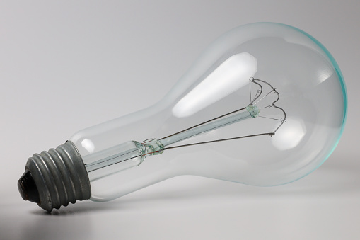 Incandescent lamp on white background
