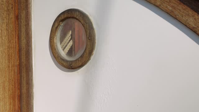 porthole on the ship close-up, there is a place for an inscription