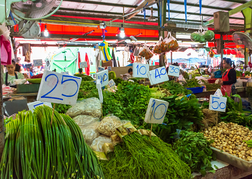 A fruit and vegetable market stall at the Khlong Toei market in Bangkok, Thailand