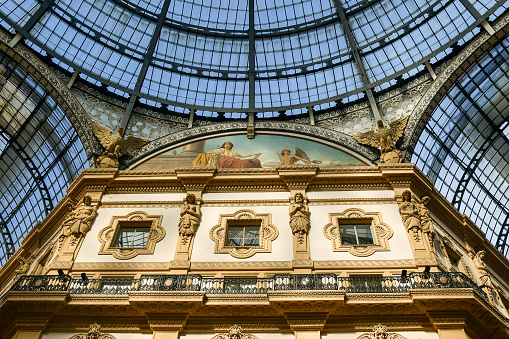 Milan, Lombardy, Italy - 10 21 2023: Housed within a four-story double arcade in the centre of town,[1] the Galleria is named after Victor Emmanuel II, the first king of the Kingdom of Italy.