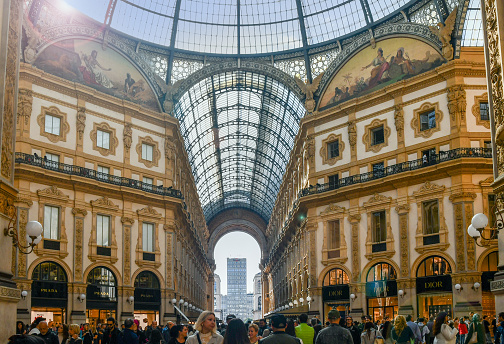 Milan, Lombardy, Italy - 10 21 2023: Housed within a four-story double arcade in the centre of town, the Galleria is named after Victor Emmanuel II, the first king of the Kingdom of Italy.