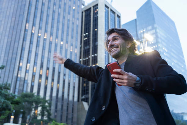 istock View of young man using a smartphone at twilight 1983017432